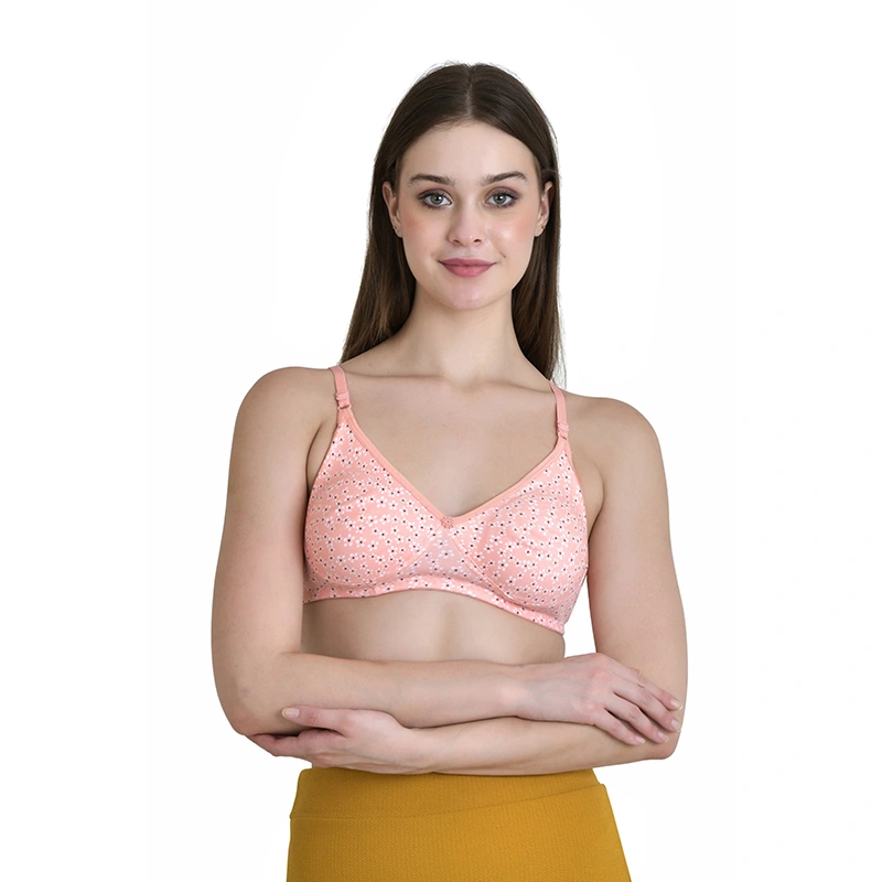Peach polka dot print bra with thin straps and mustard yellow skirt - lingerie ecommerce photography by Lohar Studio Delhi